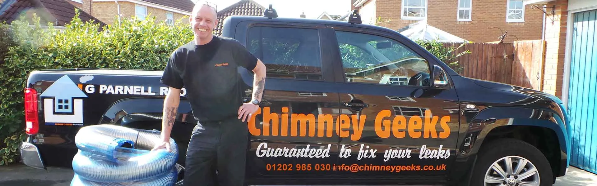 Graham from Chimney Geeks with the branded van — a family-run local business